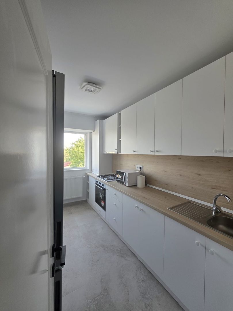Apartament 3 camere de inchiriat - imaginea 2