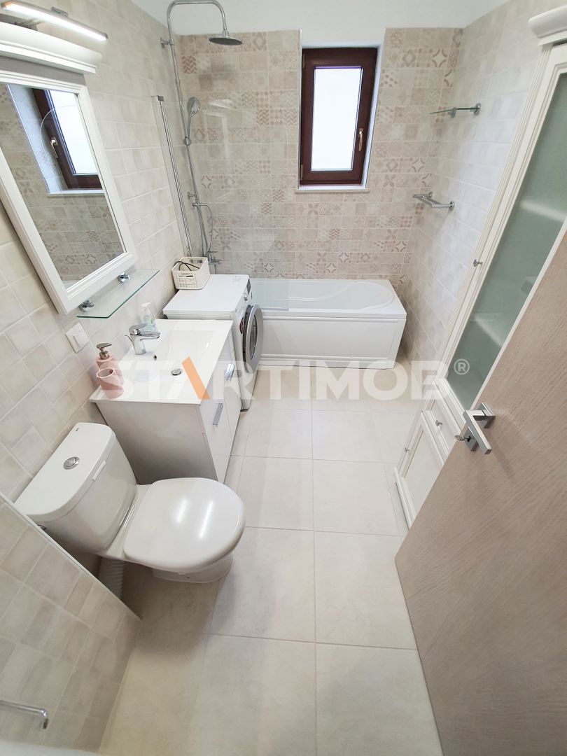 Apartament mobilat 3 camere cu parcare subterana