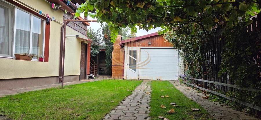 Casă din cărămidă cu spațiu comercial la stradă, garaj și curte - imaginea 15